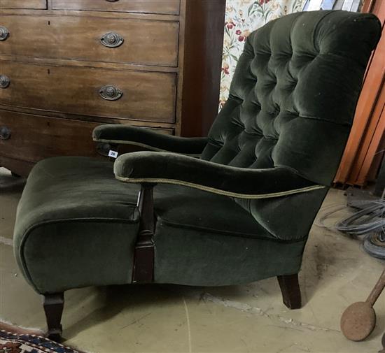 An Edwardian green velvet club armchair, width 75cm, depth 80cm, height 90cm